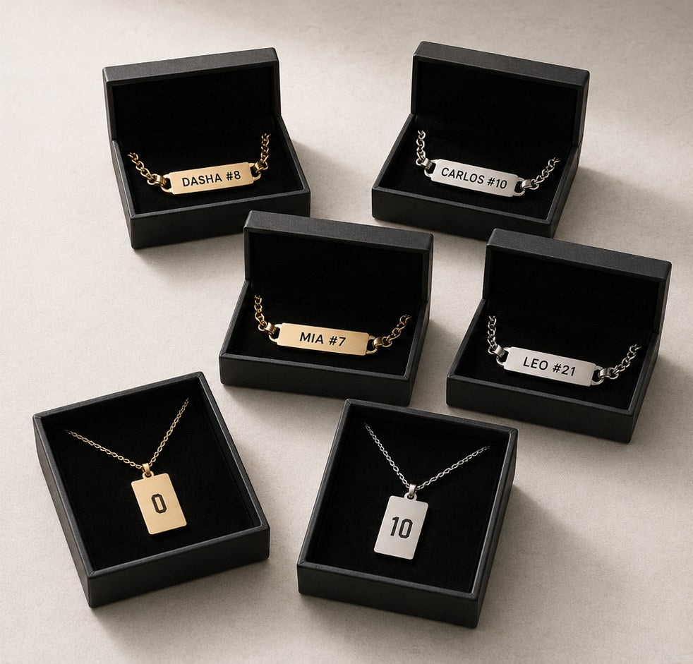 Team order of engraved Persona pendants in crest-branded boxes