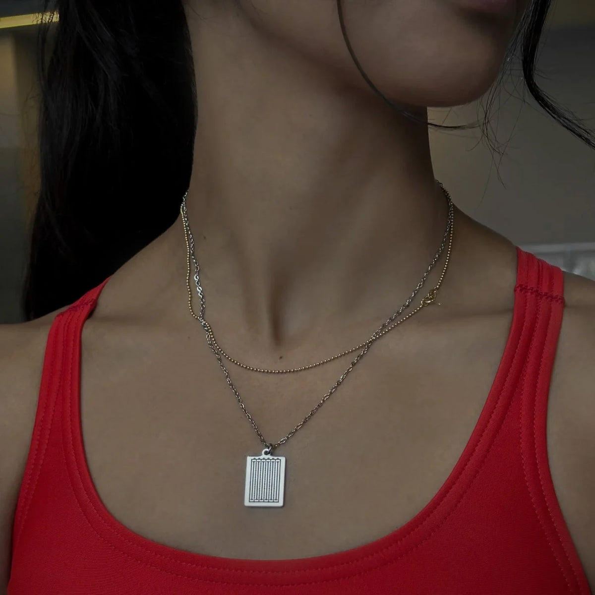 Swimming necklace worn